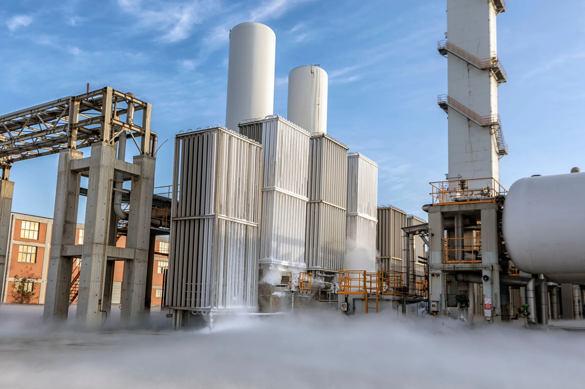 View of the industrial oxygen tanks in the chemical plant. It is an oxygen storage vessel, which is either held under pressure in gas cylinders, or as liquid oxygen in a cryogenic storage tank.