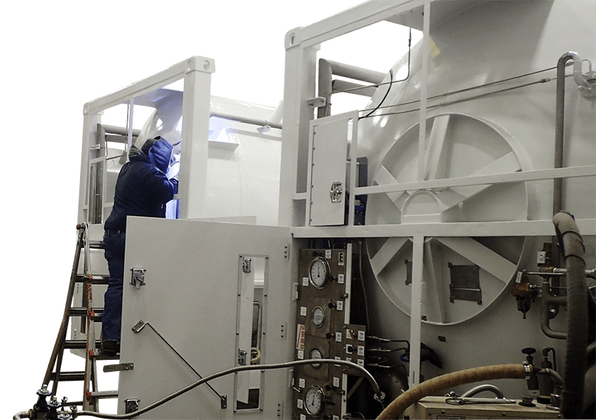 worker repairing and inspecting  a helium container